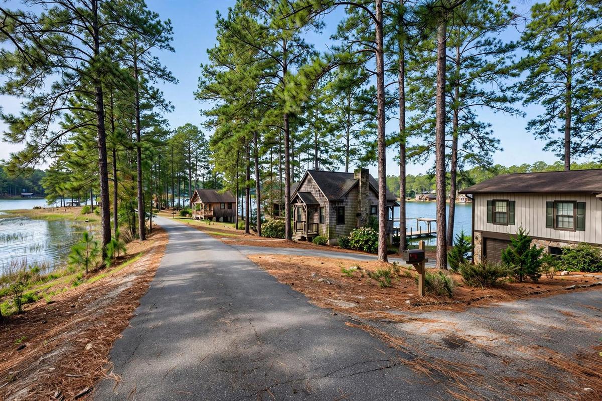 Does a Lake Oconee Cottage Sell for Its View or Its Structure? Reading the 87.5% Builder-Demand Rate, the Land-Residual Arithmetic and the Lakefront Premium